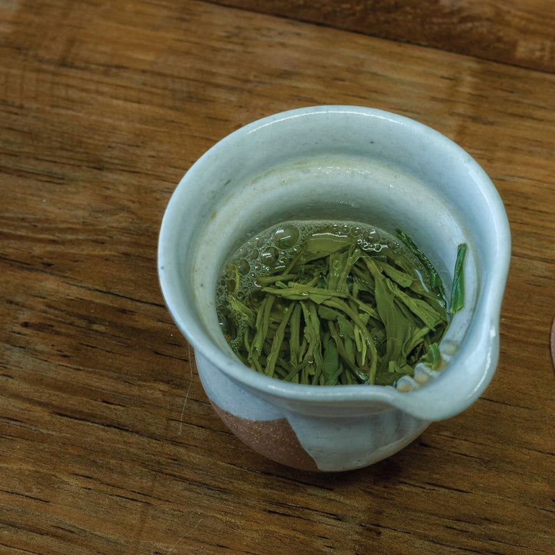 Hojas húmedas de té verde Lu Shan Yun Wu
